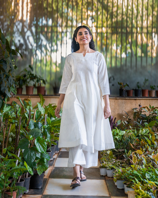 Saphed White Cotton kurta set with Flared pants